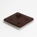 Simuliertes Gewebe mit Hautläsionen, dunkelhäutig